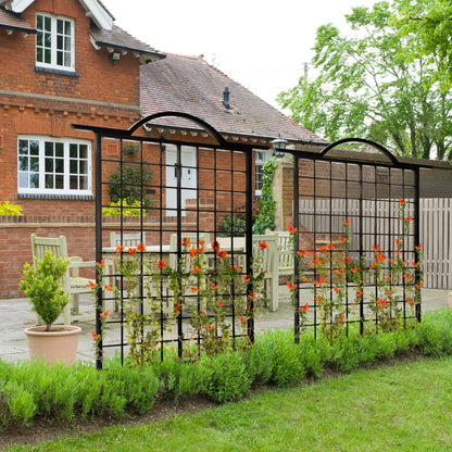 H Potter Garden Trellis Screen set of 2 in a front landscaped yard with orange flowers