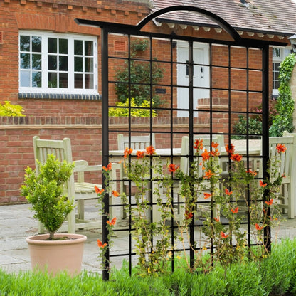 H Potter black metal garden arch trellis with climbing plants in a garden setting.