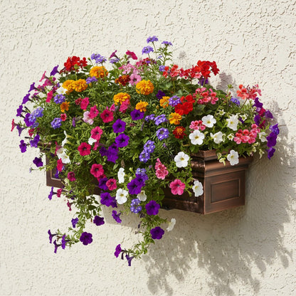 H Potter Williamsburg 30 inch copper window box mounted under window filled with flowers petunias, verbena, marigold, ivy geraniums