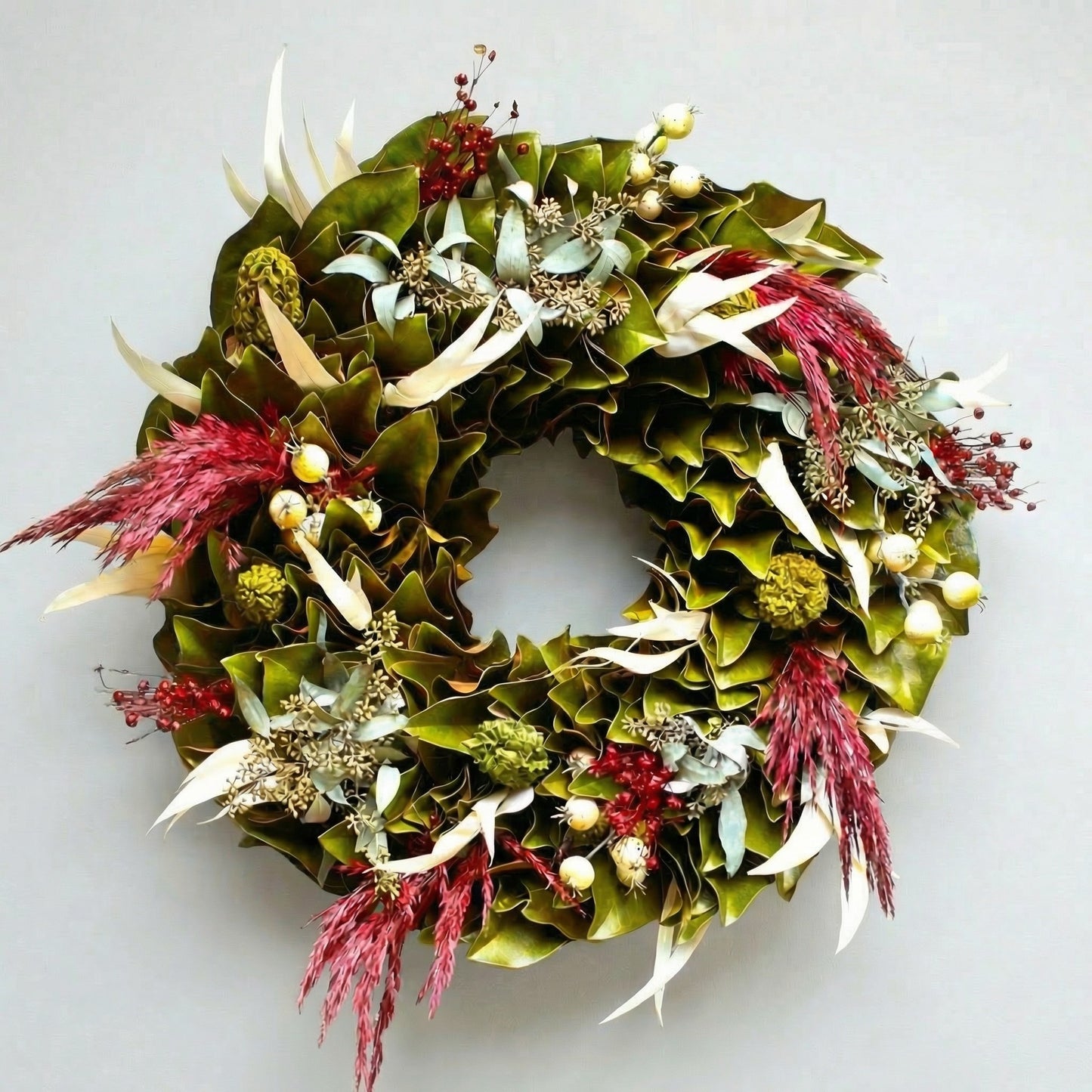 h potter woodland magnolia dried wreath on white wall in home
