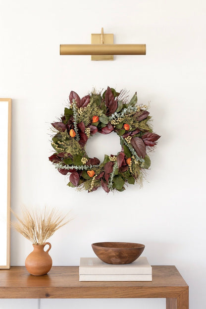 H Potter fall wreath—burgundy & green salal with sweet Annie, baby eucalyptus, twigs, canella berries, Chinese lanterns.
