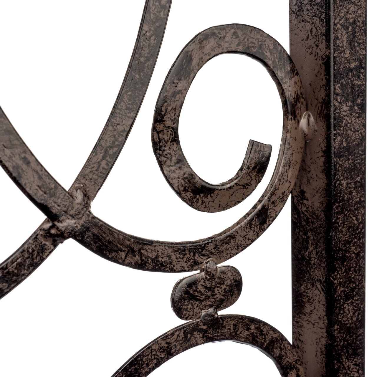 Scroll ironwork detail—handcrafted, strong for roses; tie points guide growth; low upkeep.