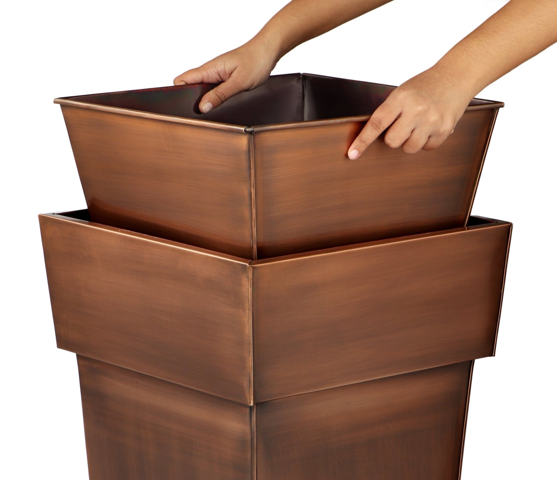 Top rim detail and planting insert of H Potter tall square planter, stainless steel construction with copper finish