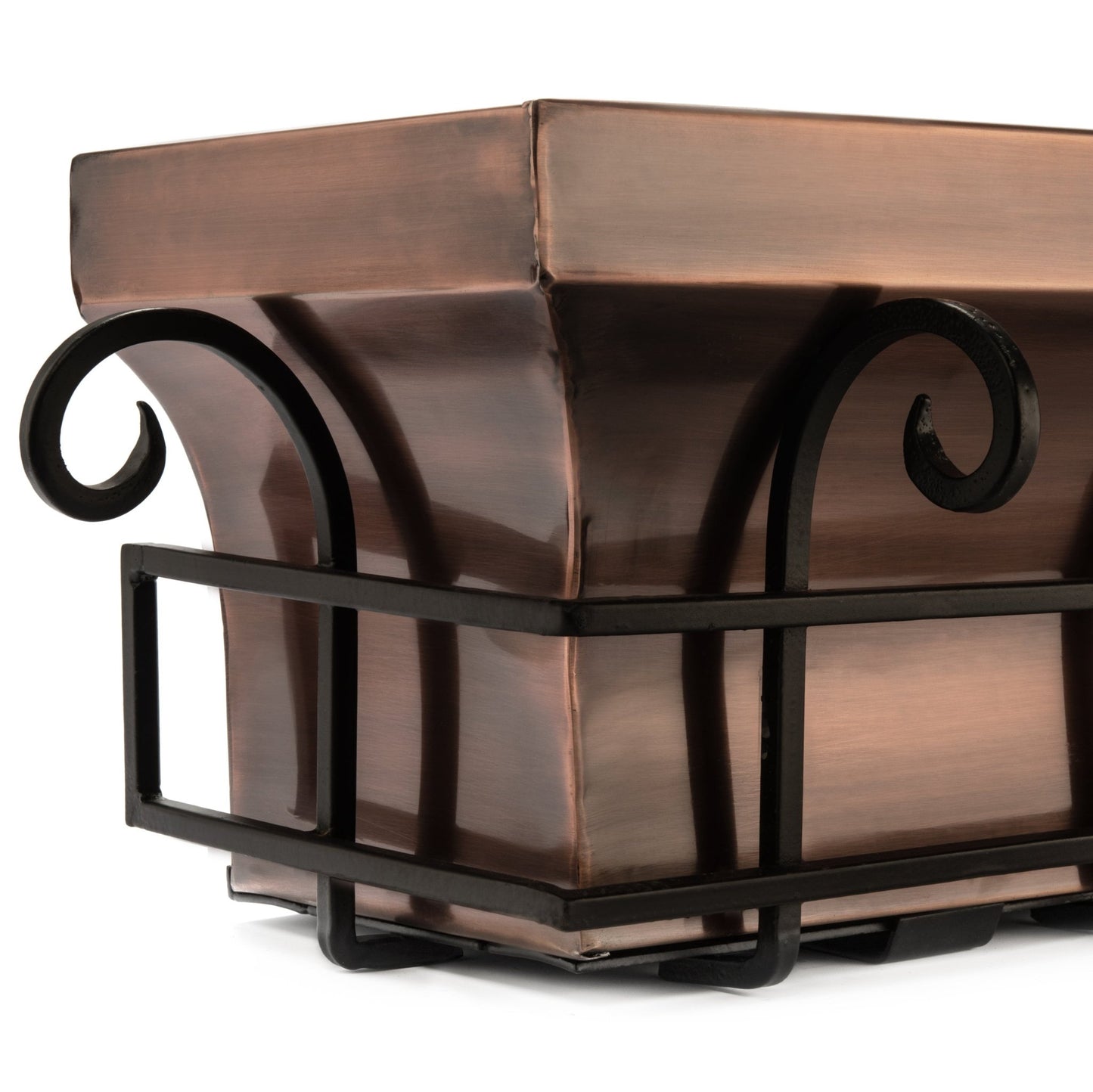 Close-up detail of H Potter scrolled iron frame and antique copper window box corner